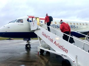 Professional rugby team boarding aircraft for travel to European competition fixture